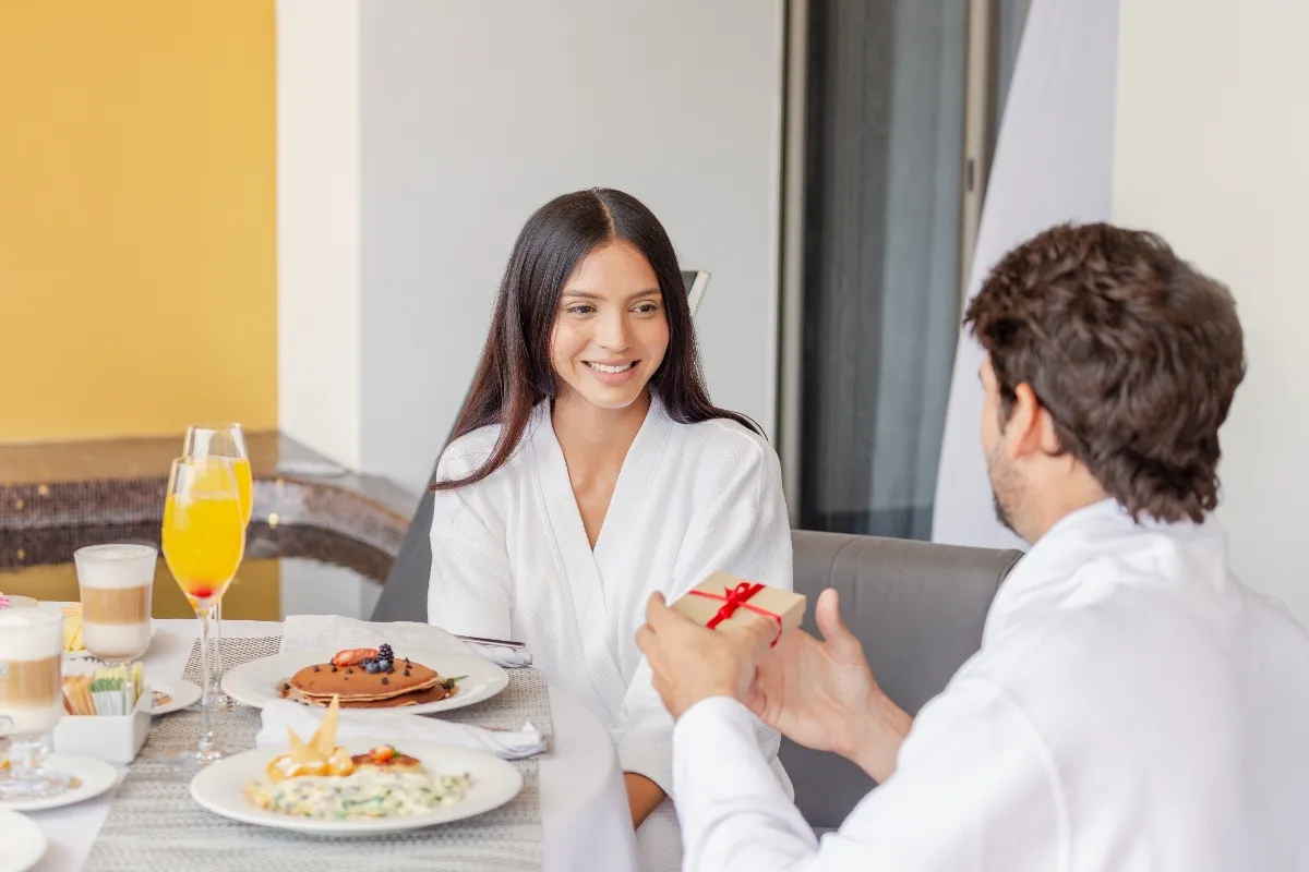 couple having breakfast at their suite