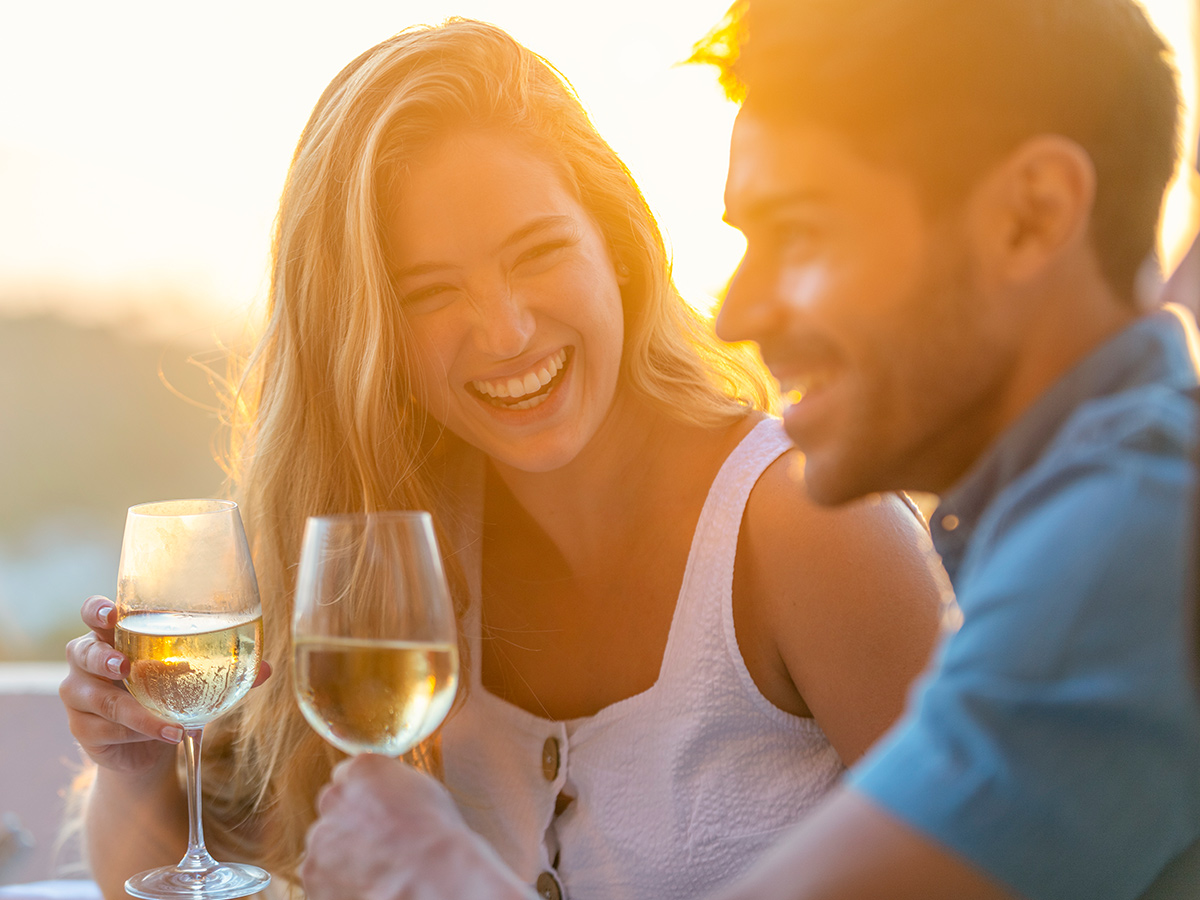 Couple smiling during a wine tasting activity