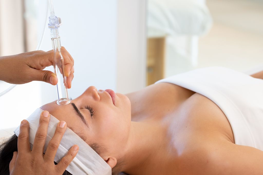 Spa therapist during Binary Premium treatment